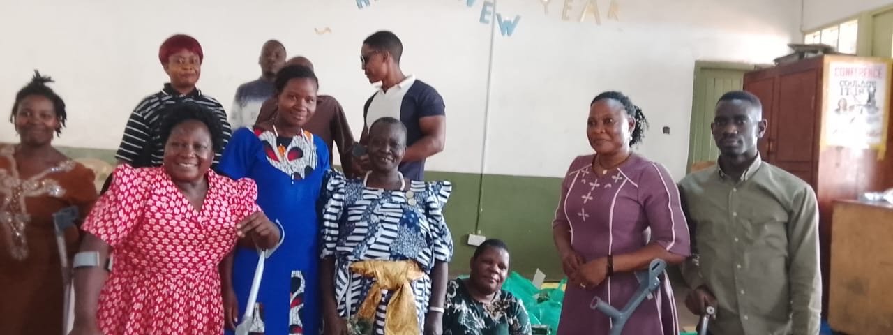 KPDDI members gathered together in the community hall in Kireka